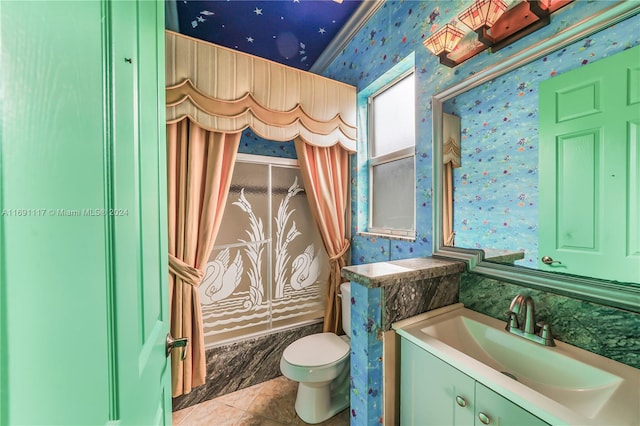 full bathroom with shower / tub combination, tile patterned floors, vanity, and toilet