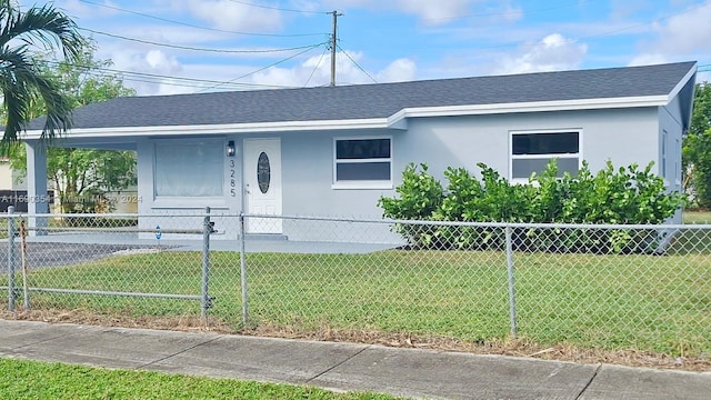 view of front of property with a front lawn