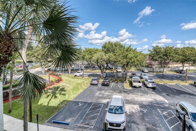 view of home's community with a yard