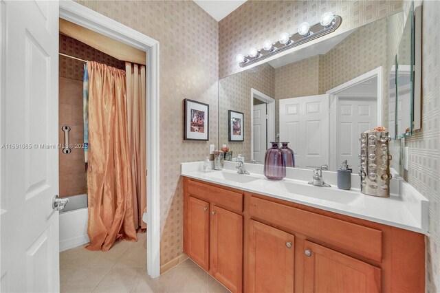 bathroom featuring vanity, tile patterned flooring, and shower / bath combo with shower curtain