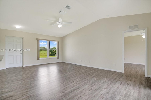 unfurnished room featuring light hardwood / wood-style floors, ceiling fan, and lofted ceiling