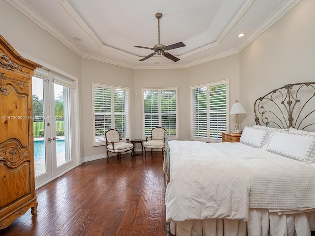 bedroom featuring dark wood-type flooring, access to exterior, multiple windows, and french doors