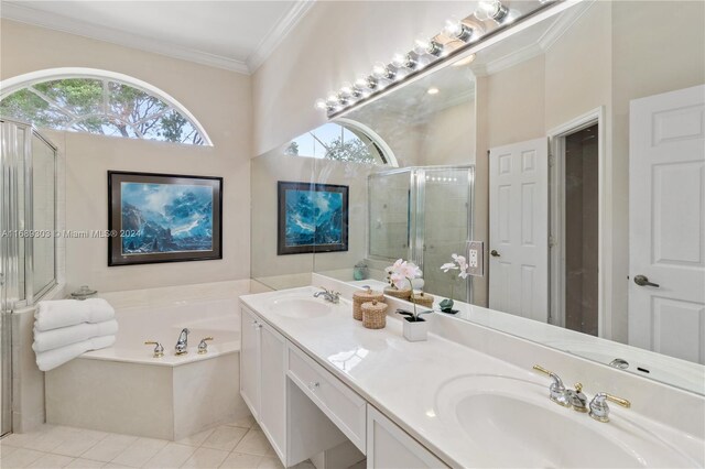 bathroom with shower with separate bathtub, vanity, tile patterned floors, and crown molding