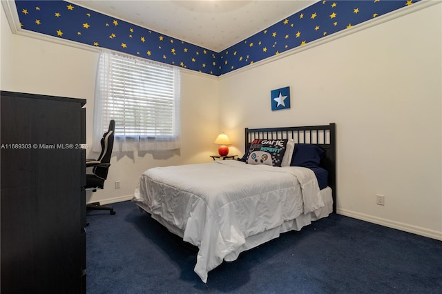 carpeted bedroom with ornamental molding