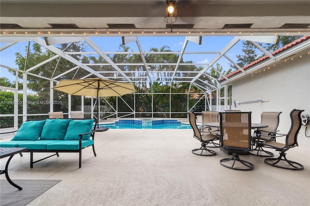 swimming pool featuring a patio, an outdoor living space, and a lanai