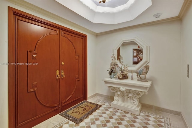 entrance foyer featuring ornamental molding