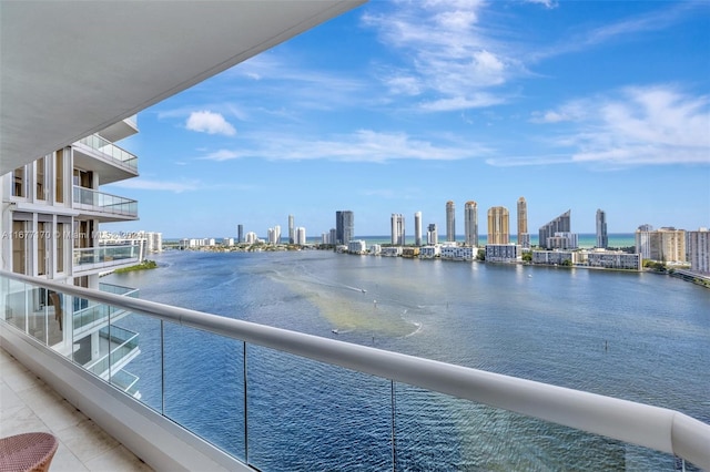 balcony featuring a water view