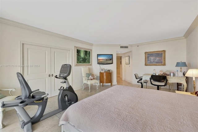 bedroom featuring a closet and ornamental molding