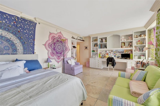 bedroom with built in desk and crown molding