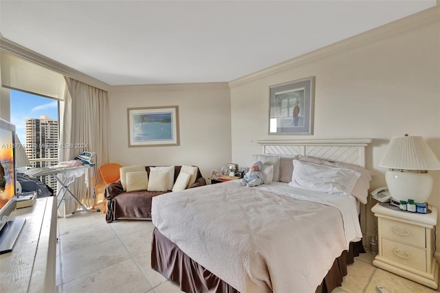 bedroom with light tile patterned floors and crown molding