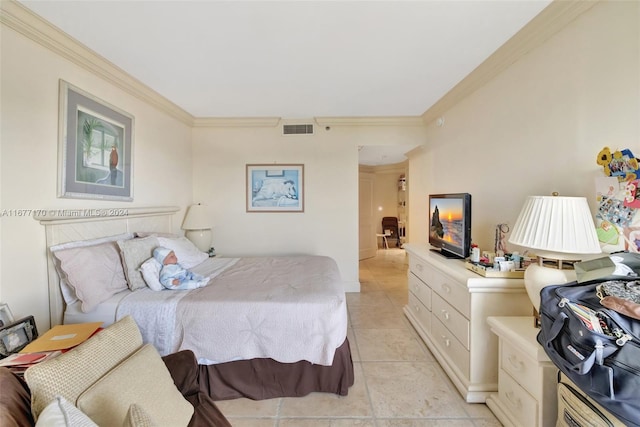 bedroom featuring light tile patterned flooring and ornamental molding