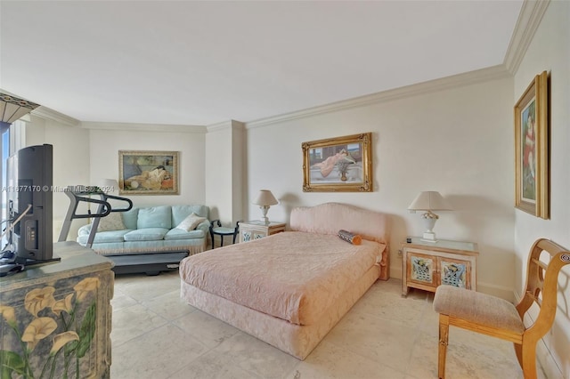 bedroom with crown molding