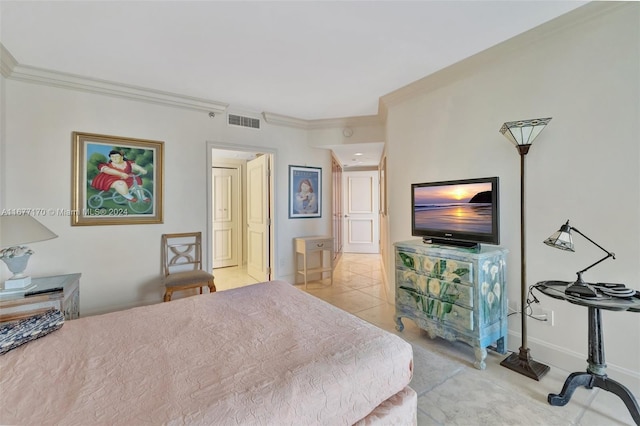 bedroom featuring light tile patterned flooring and crown molding