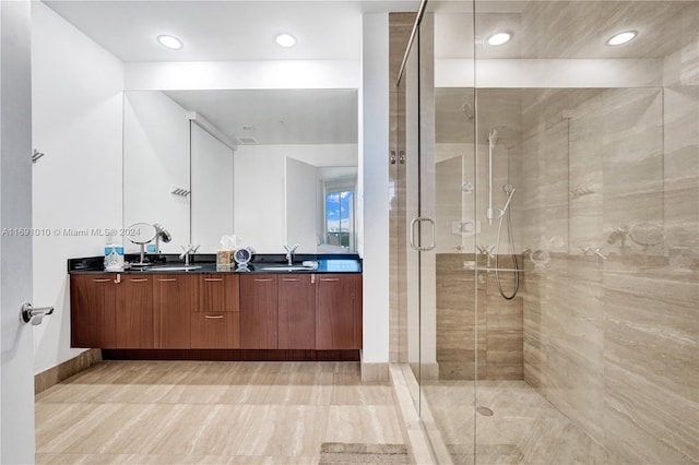 bathroom featuring vanity and walk in shower