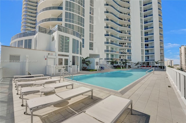 view of pool with a patio area