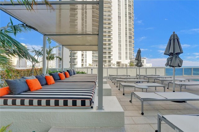 view of patio featuring a water view