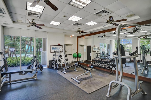 workout area featuring a drop ceiling