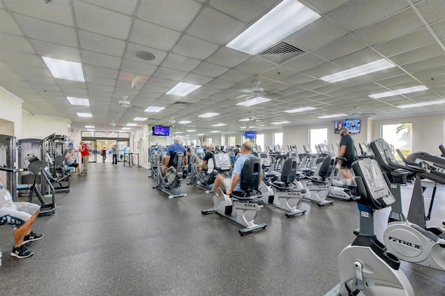 workout area featuring a paneled ceiling