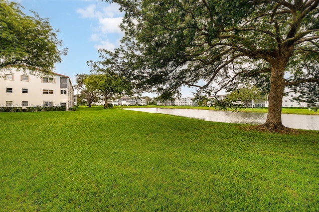 view of yard with a water view