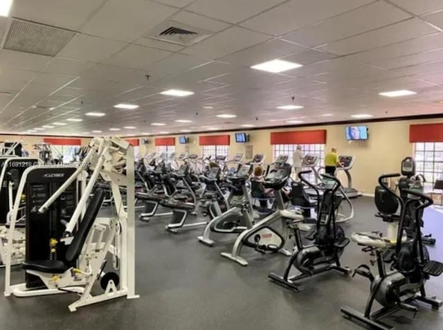 workout area featuring a drop ceiling