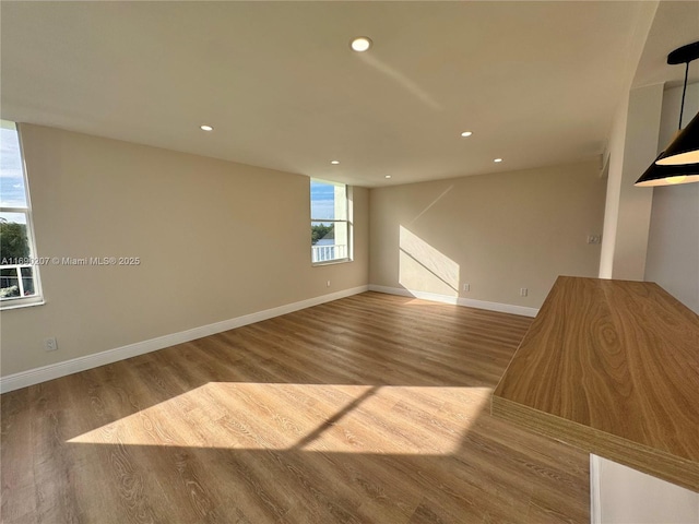 16546 NE 26th Ave Unit 3G, North Miami Beach, FL 33160 - empty room with wood finished floors and recessed lighting