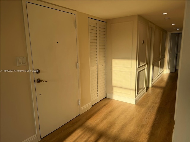 16546 NE 26th Ave Unit 3G, North Miami Beach, FL 33160 - corridor featuring light wood-type flooring and recessed lighting