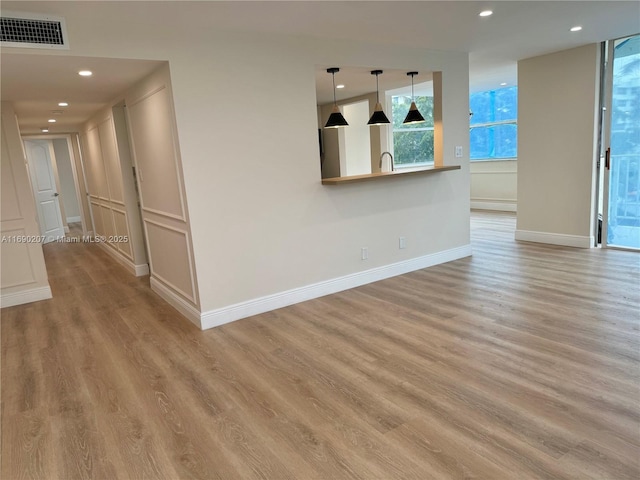 16546 NE 26th Ave Unit 3G, North Miami Beach, FL 33160 - empty room with wood finished floors and recessed lighting