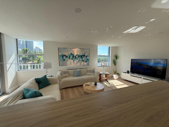 16546 NE 26th Ave Unit 3G, North Miami Beach, FL 33160 - living room featuring wood finished floors