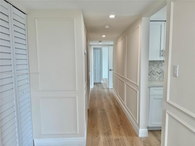 16546 NE 26th Ave Unit 3G, North Miami Beach, FL 33160 - corridor featuring light wood-style flooring and recessed lighting