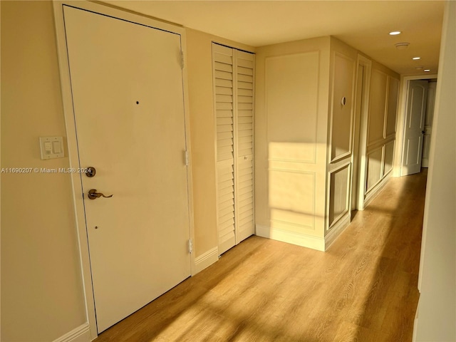 hallway featuring light wood-type flooring