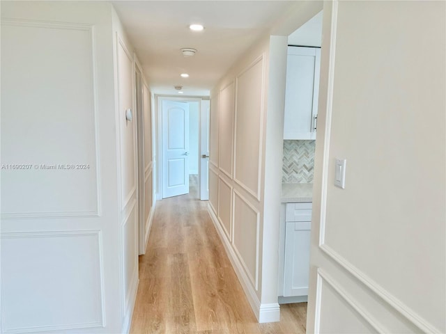 hall featuring light wood-type flooring