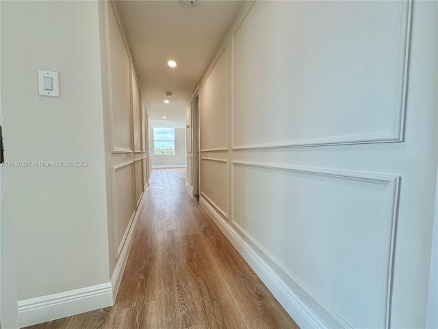 16546 NE 26th Ave Unit 3G, North Miami Beach, FL 33160 - hall with wood finished floors and recessed lighting