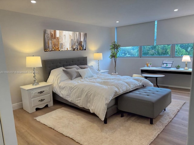 16546 NE 26th Ave Unit 3G, North Miami Beach, FL 33160 - bedroom featuring light wood finished floors and recessed lighting