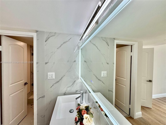 16546 NE 26th Ave Unit 3G, North Miami Beach, FL 33160 - bathroom with wood finished floors and vanity