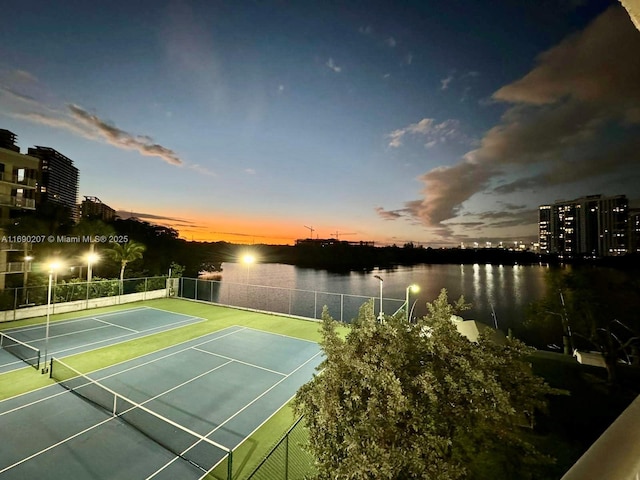 16546 NE 26th Ave Unit 3G, North Miami Beach, FL 33160 - view of tennis court with a water view
