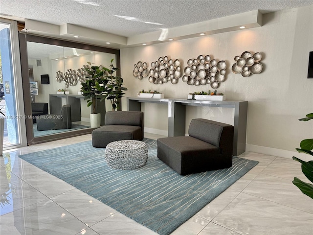 16546 NE 26th Ave Unit 3G, North Miami Beach, FL 33160 - lobby featuring a textured ceiling