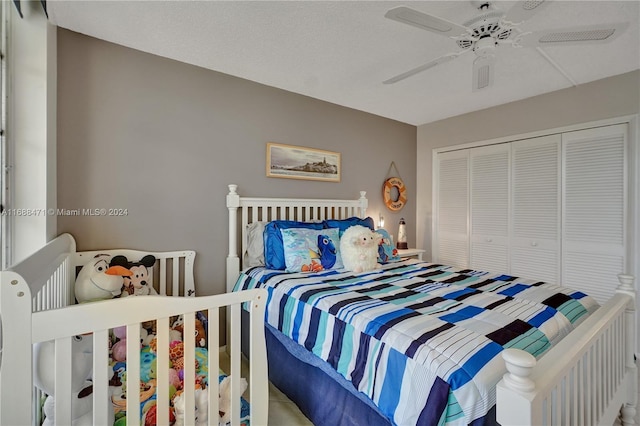 bedroom with a closet and ceiling fan