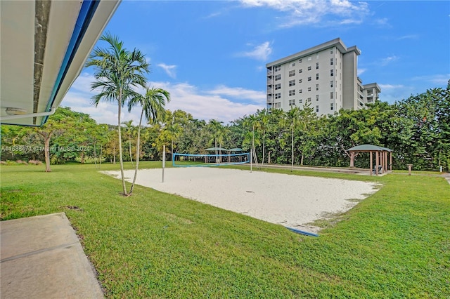 view of property's community featuring volleyball court, a yard, and a gazebo