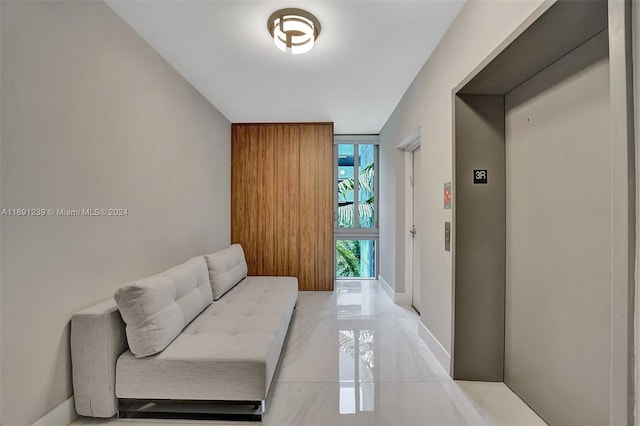 16385 NE Biscayne Blvd Unit 307 2Parking, North Miami Beach, FL 33160 - sitting room featuring elevator and baseboards