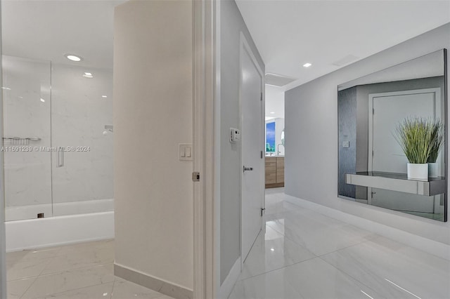 16385 NE Biscayne Blvd Unit 307 2Parking, North Miami Beach, FL 33160 - corridor featuring baseboards, light marble finish flooring, and recessed lighting