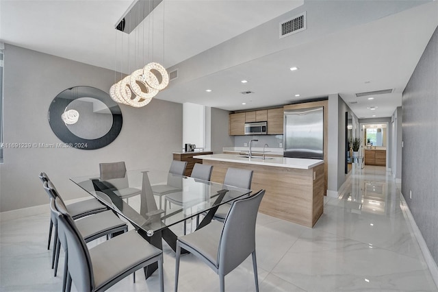 16385 NE Biscayne Blvd Unit 307 2Parking, North Miami Beach, FL 33160 - dining room featuring light marble finish flooring, a chandelier, recessed lighting, and baseboards