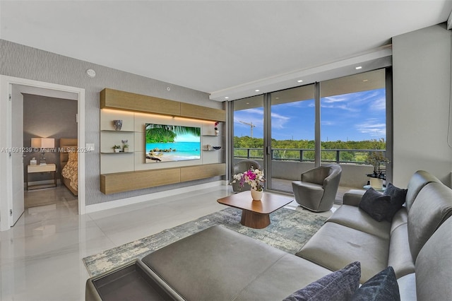 living room featuring a wall of windows