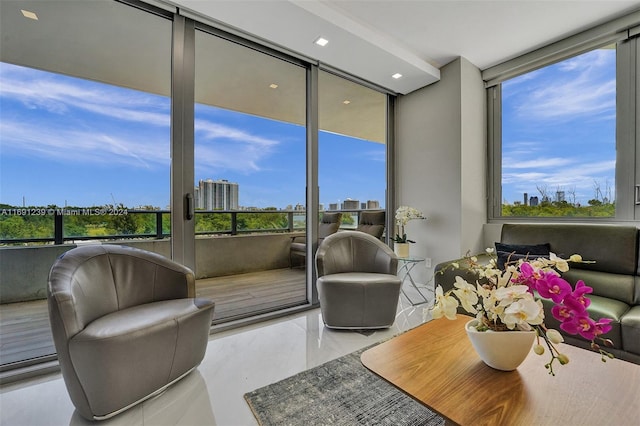 16385 NE Biscayne Blvd Unit 307 2Parking, North Miami Beach, FL 33160 - sunroom featuring a wall of windows and recessed lighting