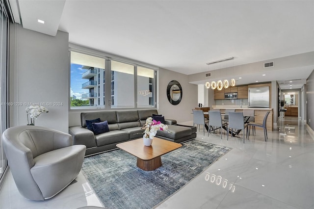 16385 NE Biscayne Blvd Unit 307 2Parking, North Miami Beach, FL 33160 - living area featuring light marble finish flooring