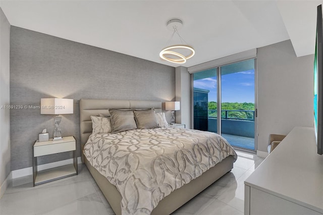 bedroom with access to outside and floor to ceiling windows