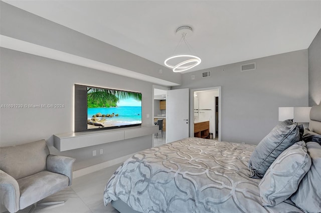 16385 NE Biscayne Blvd Unit 307 2Parking, North Miami Beach, FL 33160 - bedroom with a chandelier and ensuite bath