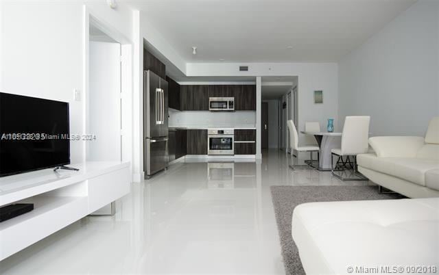 living room featuring light tile patterned floors