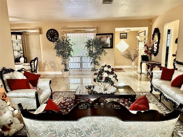 living room featuring plenty of natural light