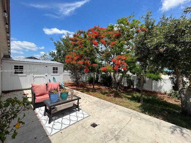 view of patio / terrace with an outdoor living space and an outdoor structure