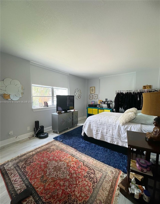 bedroom featuring hardwood / wood-style floors